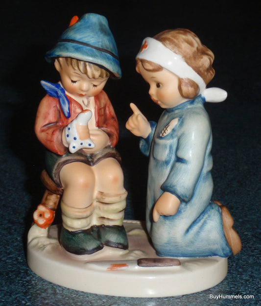 "LITTLE NURSE" Goebel Hummel Figurine #376 - Nurse Fixing A Boo Boo