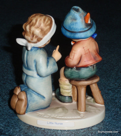 "LITTLE NURSE" Goebel Hummel Figurine #376 - Nurse Fixing A Boo Boo