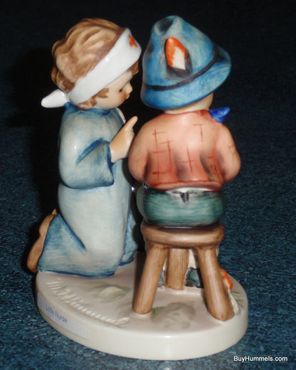 "LITTLE NURSE" Goebel Hummel Figurine #376 - Nurse Fixing A Boo Boo