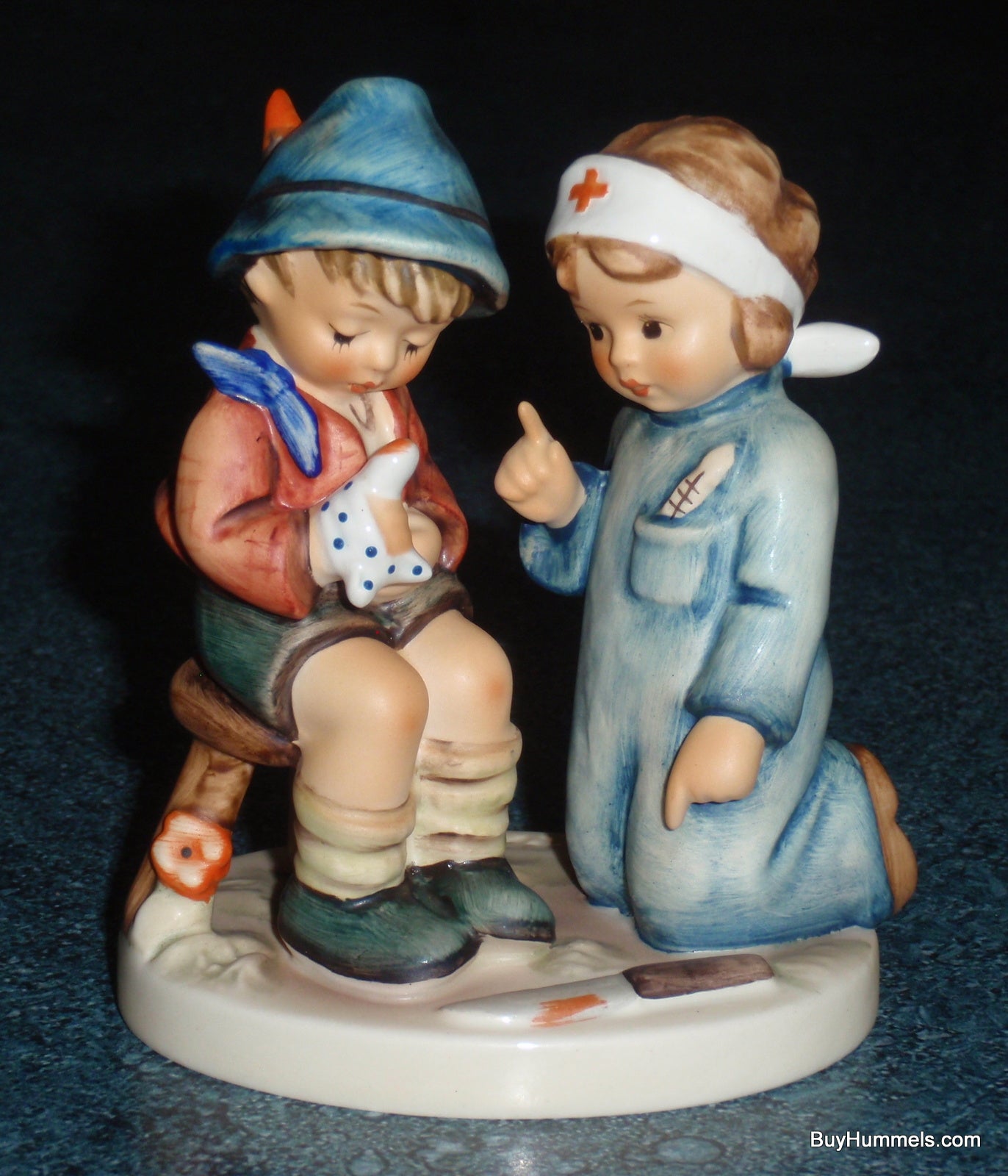 "LITTLE NURSE" Goebel Hummel Figurine #376 - Nurse Fixing A Boo Boo